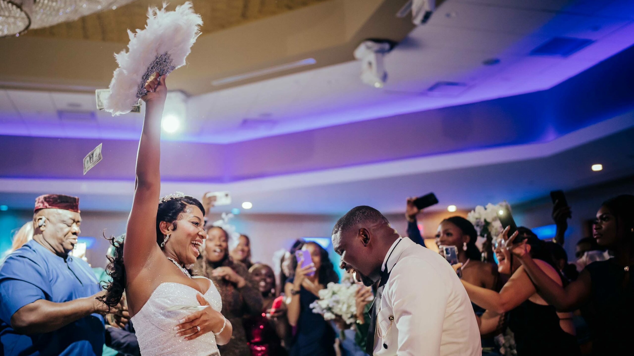 couple money spraying nigerian wedding