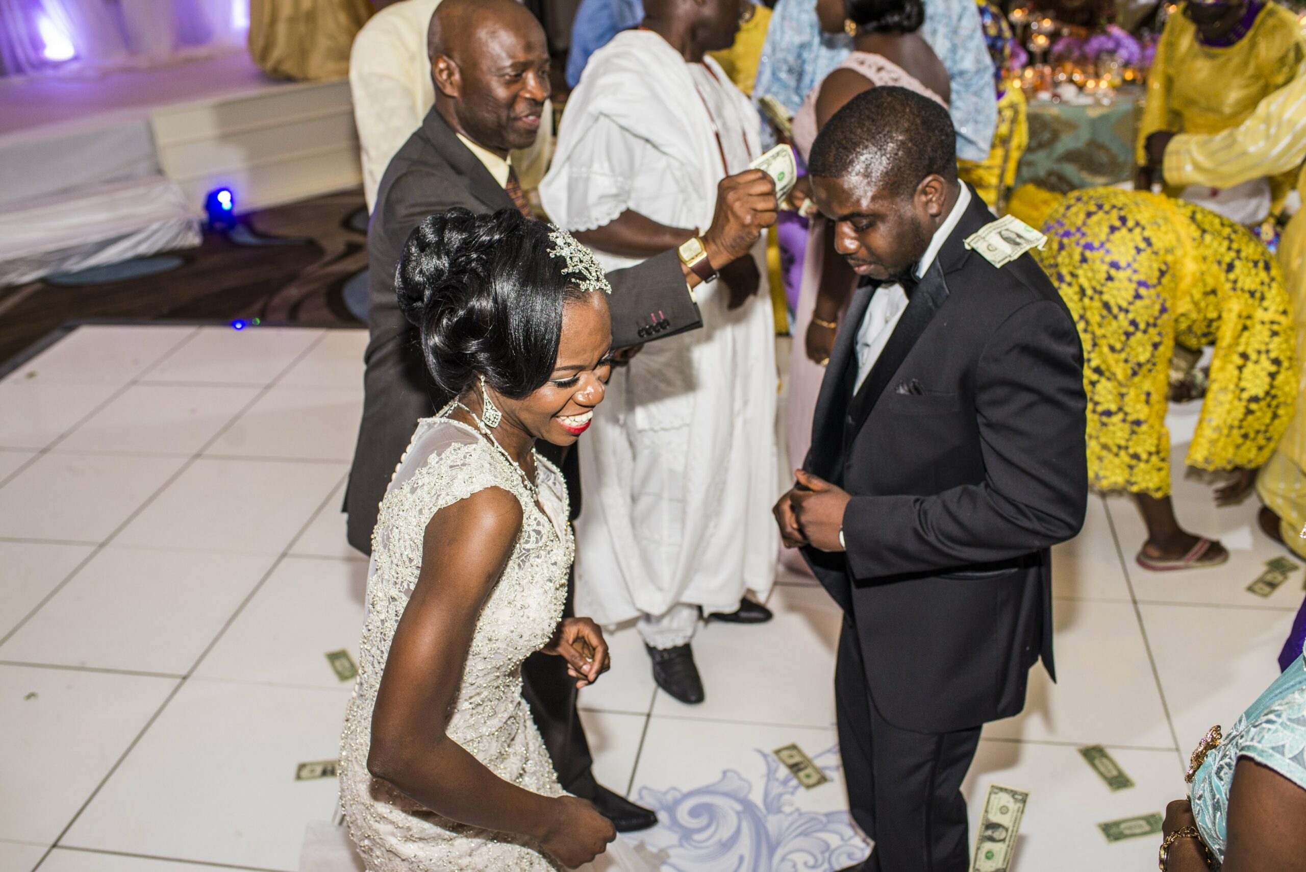 joyful money spraying nigerian wedding