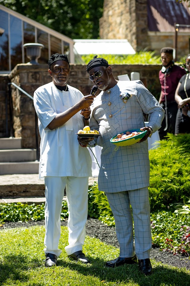 igbo family presenting kola nut during wedding